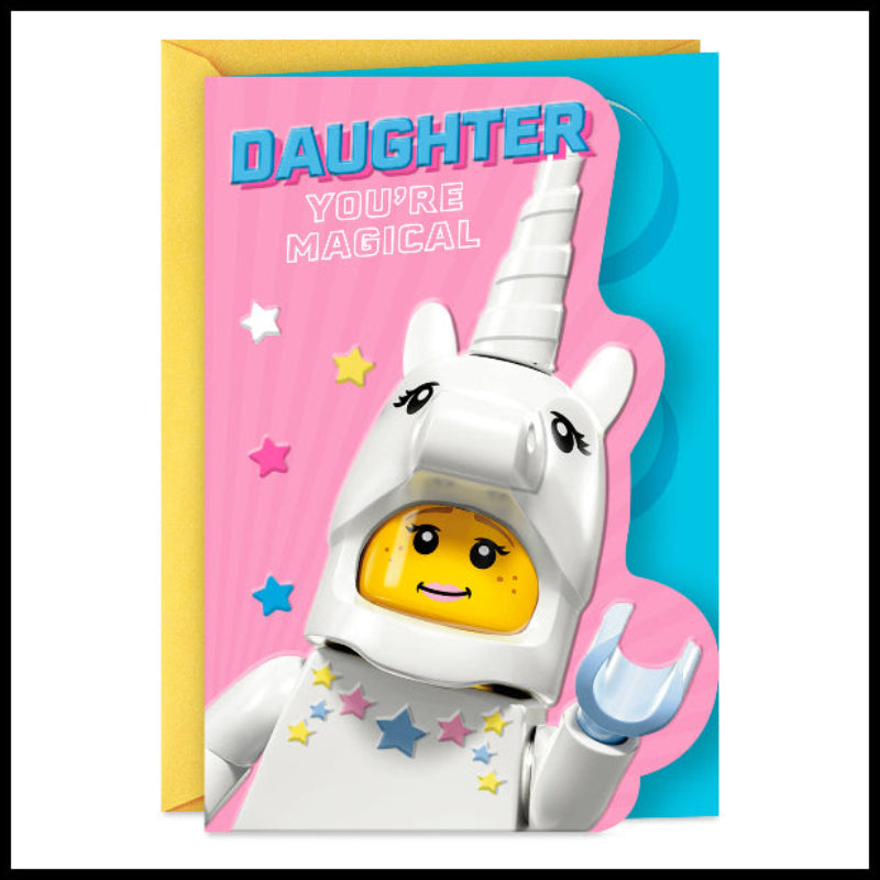 Greeting card with a LEGO figure of a unicorn and text 'Daughter, you're magical' on a pink and blue background.