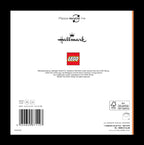 Back of a product packaging with Hallmark and LEGO branding, featuring a barcode and text.