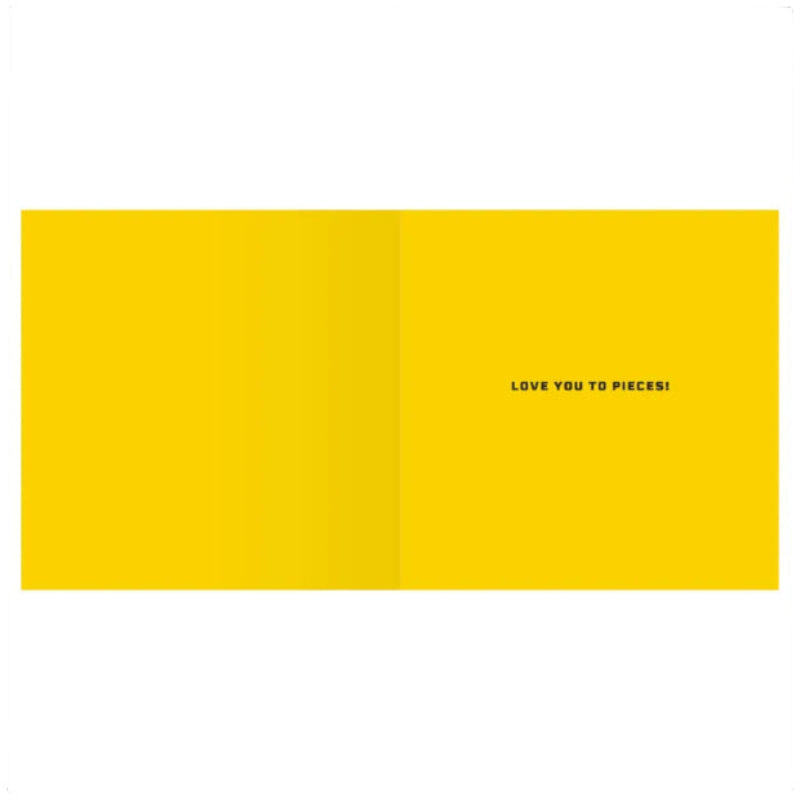 Yellow card with 'LOVE YOU TO PIECES!' text on a white background