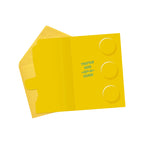 Yellow card with circular cutouts and text on a white background
