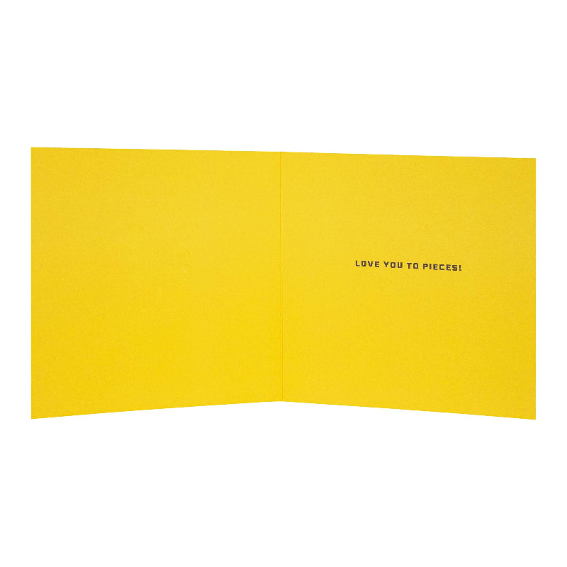 Yellow card with 'LOVE YOU TO PIECES!' text on a white background