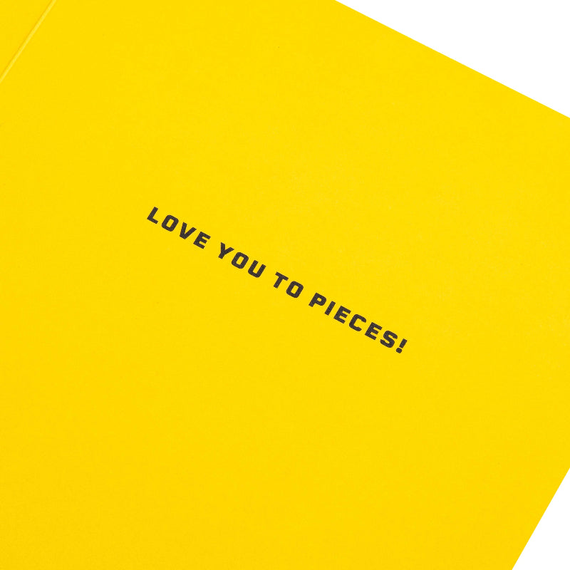 Yellow card with 'LOVE YOU TO PIECES!' text on a white background